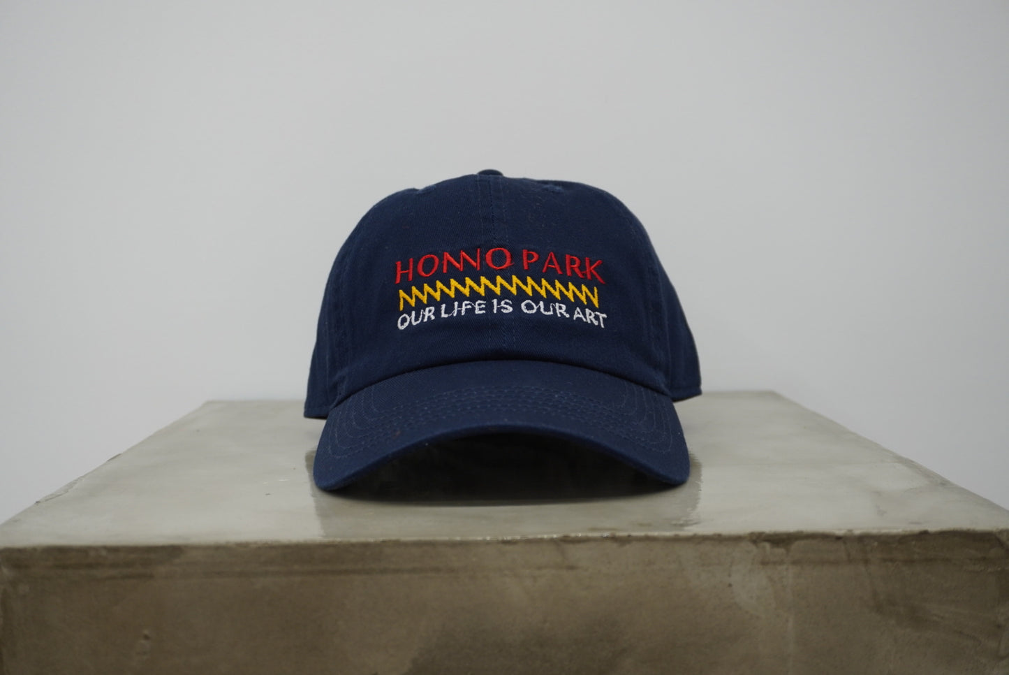 OLOA MESSAGE 6-PANEL CAP(NAVY)