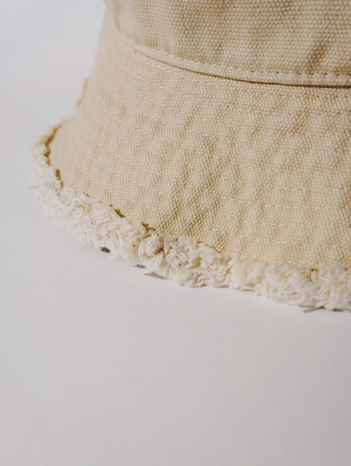 BRAIN CANVAS FRINGE BUCKET HAT(L BEIGE)