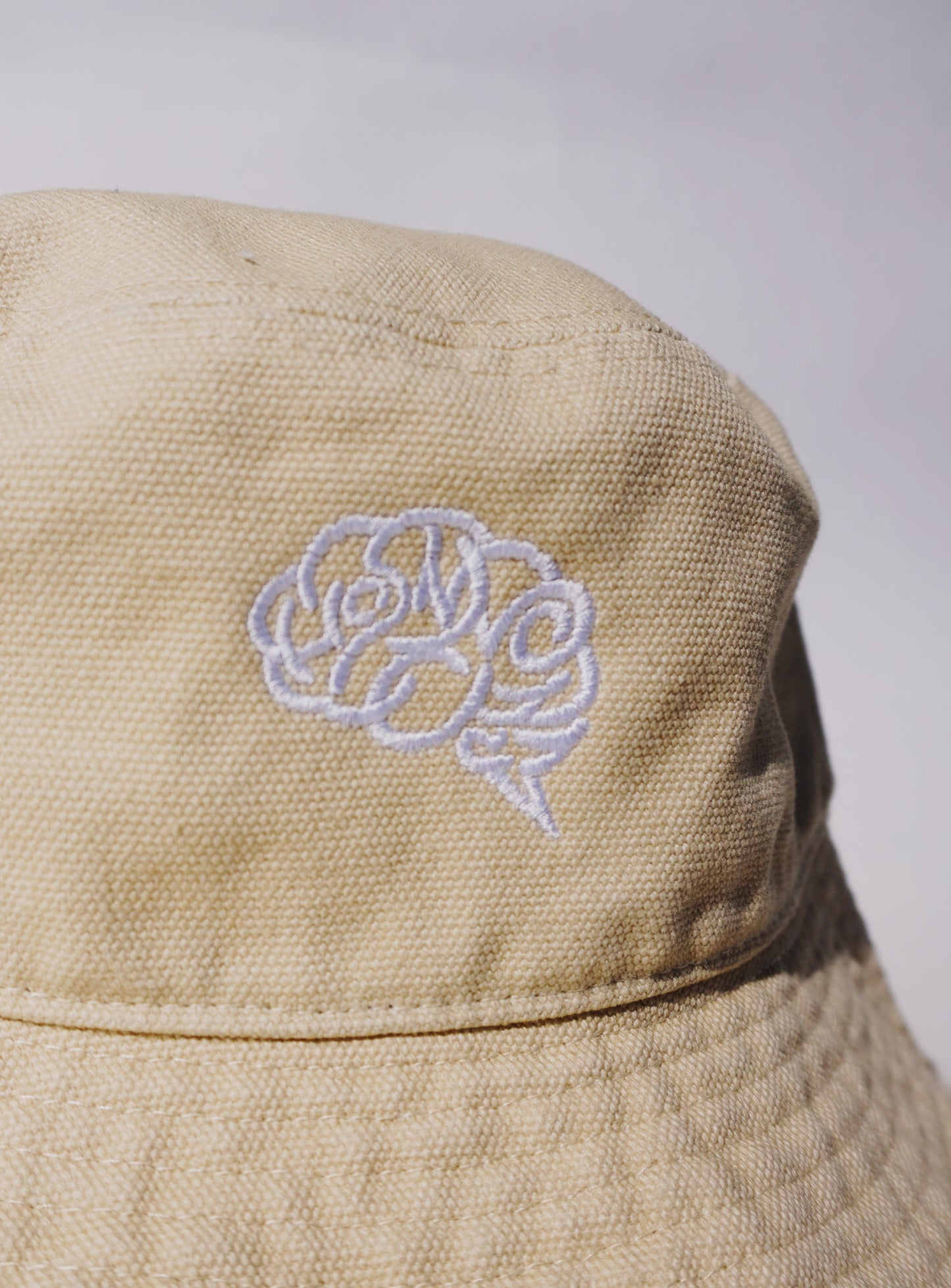 BRAIN CANVAS FRINGE BUCKET HAT(L BEIGE)