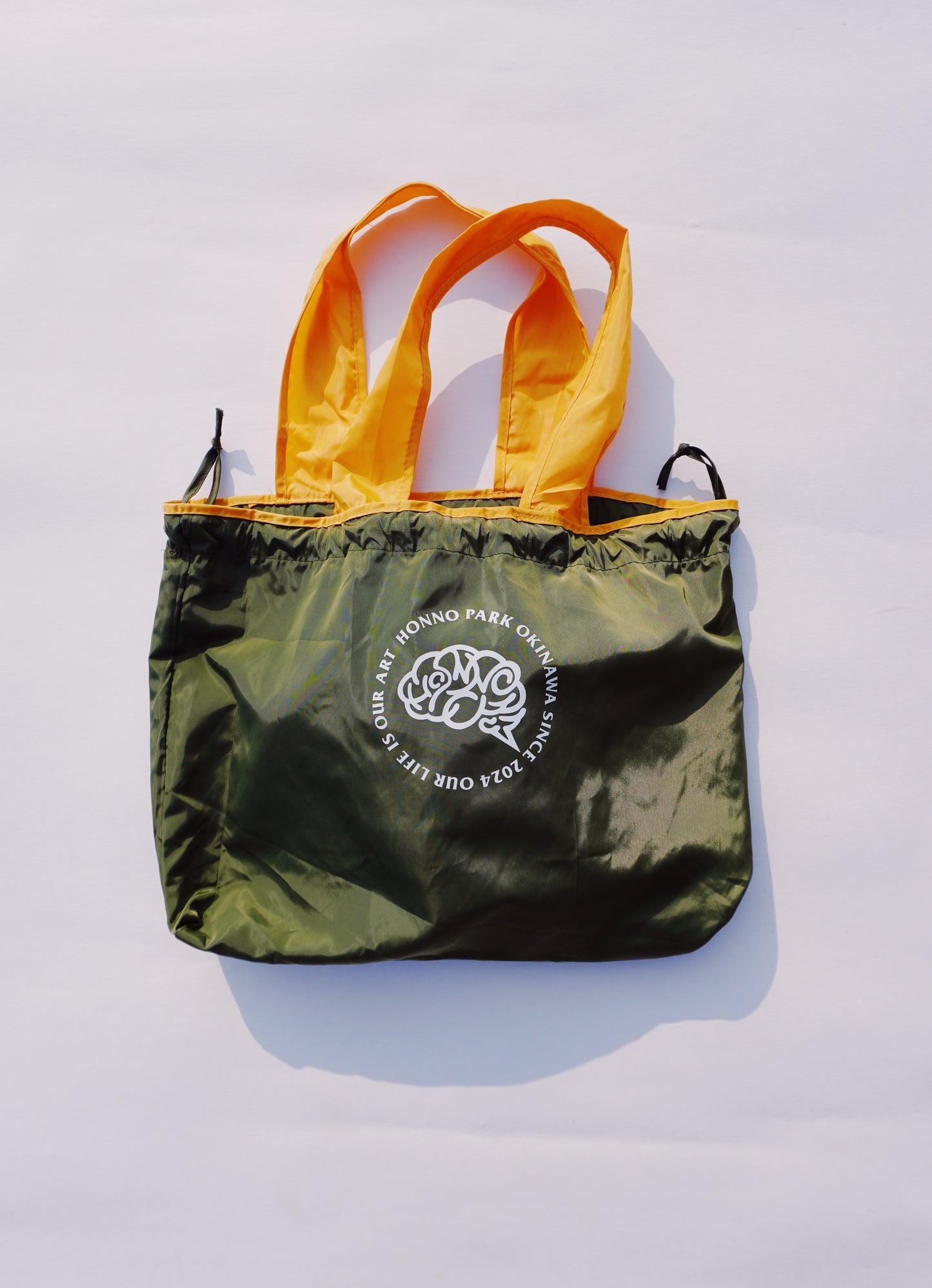 HP COMPACT MARCHE TOTE(M)KHAKI×YELLOW