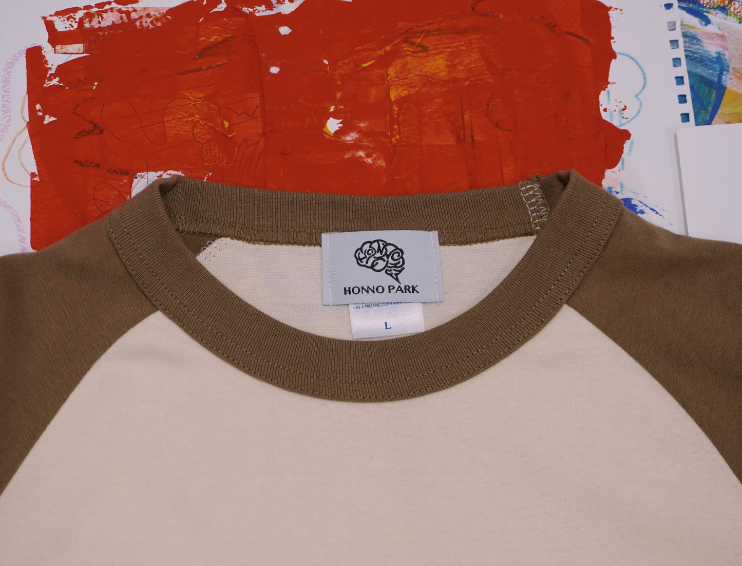 JOHN's WORD RAGLAN SLEEVE Tee(VINTAGE NATURAL✖︎CAMEL)